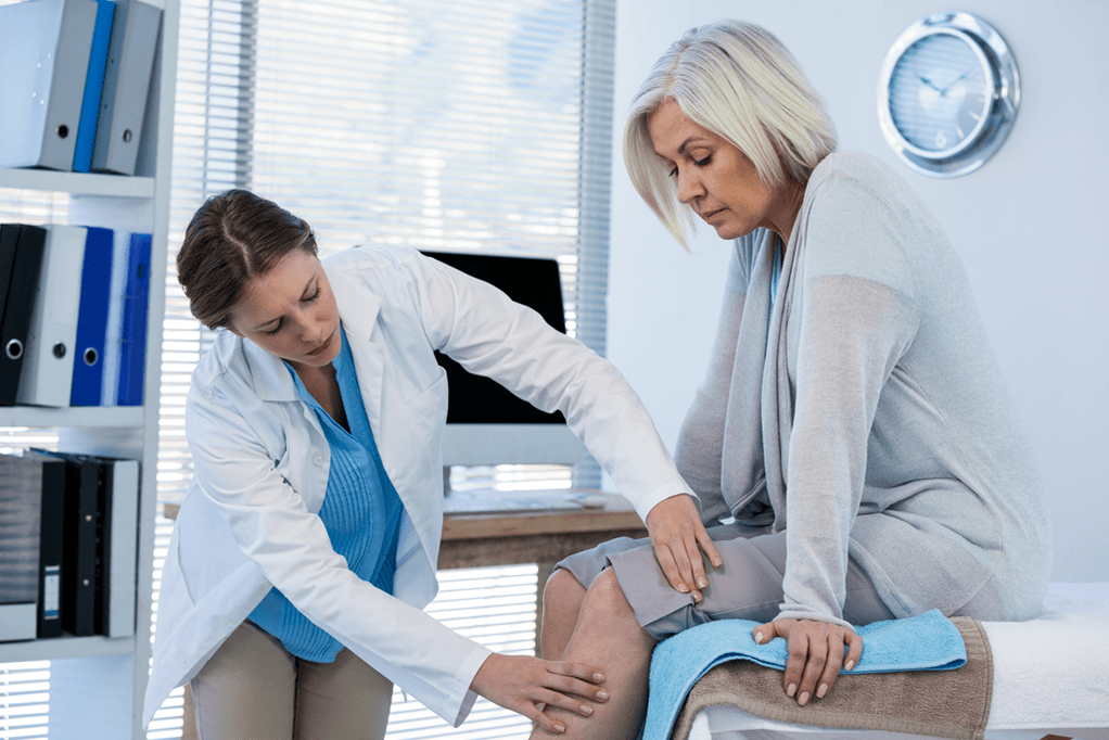 Arthritis patient in need of treatment being examined by doctor